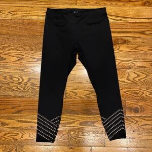 GAIAM Black Capri Leggings with Gold Pattern accents - Size Large